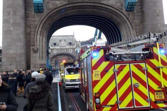Tower bridge closed as police rescue injured person